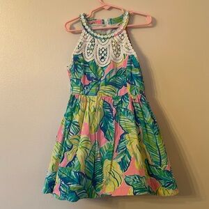 Lilly Pulitzer sun dress with lace neck detail and pockets